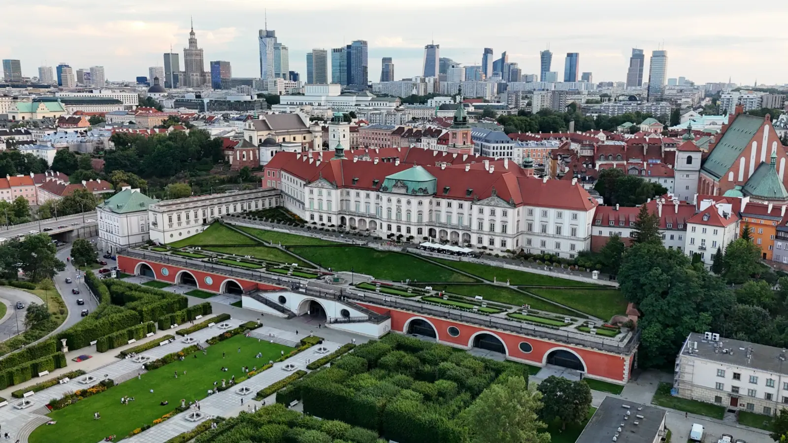 Royal Castle and gardens with modern Warsaw skyline