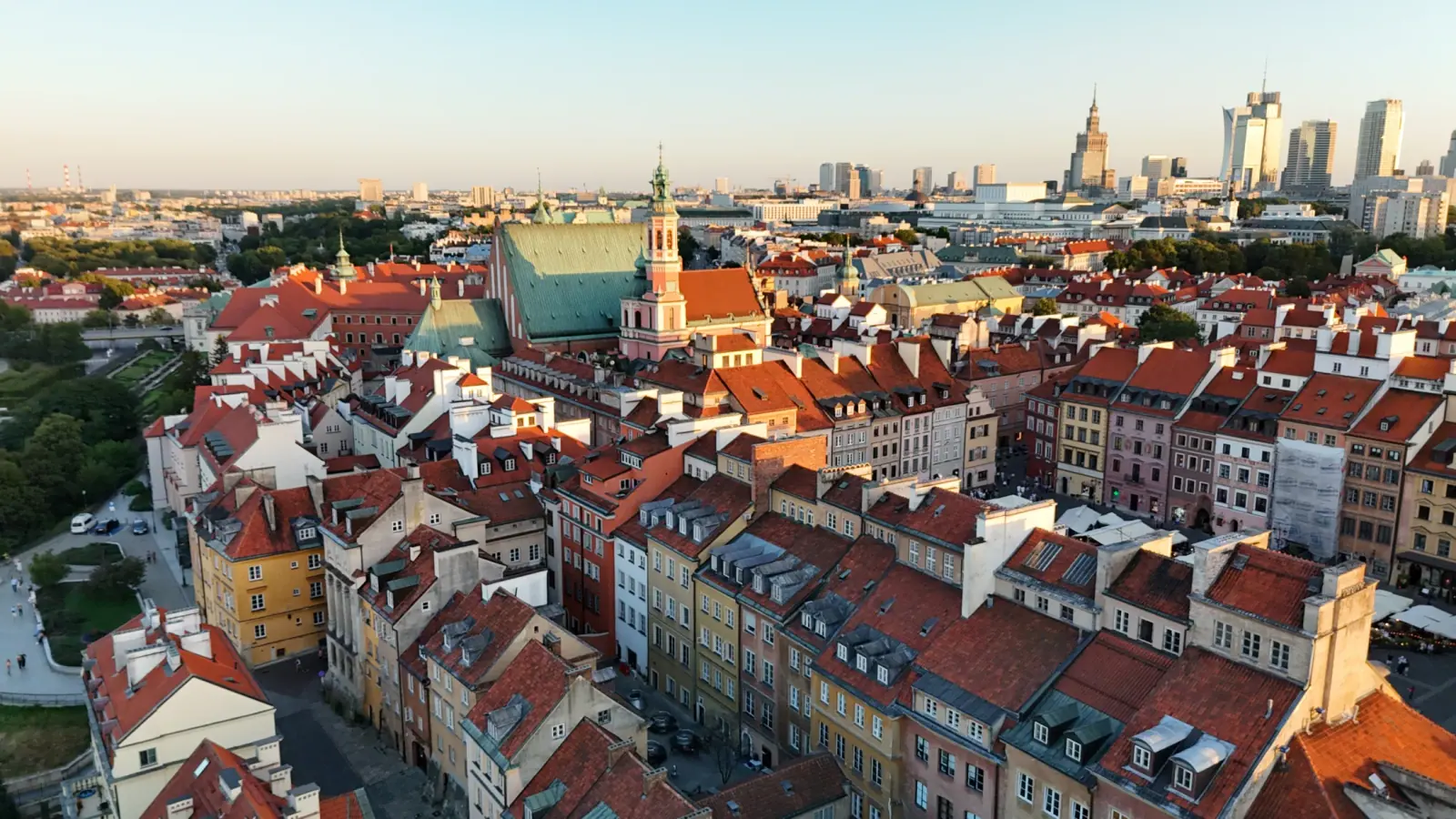 Old Town church domes against modern Warsaw towers